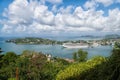 Castries, st.Lucia - November 26, 2015: Town and ships in in harbor with mountain landscape. Cruise ships in sea on cloudy sky. Su