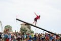 CASTRO URDIALES, SPAIN - JUNE 29: Unidentified girl falls from the greasy pole to the sea in the festival celebrated in June 29, 2 Royalty Free Stock Photo