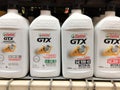 Castrol GTX motor oil bottles on shelf