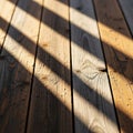 Casts diagonal shadows across the wood enhancing its warm brown and Royalty Free Stock Photo