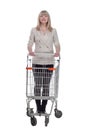 casual adult woman with shopping cart . isolated on a white background. Royalty Free Stock Photo