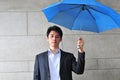 Casual Asian Man with umbrella