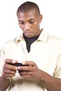 Casual Black man Texting On His Cell Phone Royalty Free Stock Photo