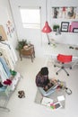 Casual blogger woman working in her fashion office. Royalty Free Stock Photo