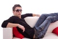 Casual boy relaxing on couch Royalty Free Stock Photo