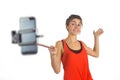 Casual brunette using selfie stick Royalty Free Stock Photo