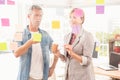 Casual business colleagues working with sticky notes Royalty Free Stock Photo