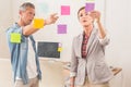 Casual business colleagues working with sticky notes Royalty Free Stock Photo