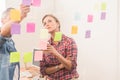 Casual business colleagues working with sticky notes Royalty Free Stock Photo