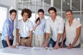 Casual business team having a meeting smiling at camera Royalty Free Stock Photo