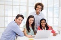 Casual business team smiling at camera during meeting Royalty Free Stock Photo