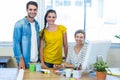 Casual business team smiling at camera during meeting Royalty Free Stock Photo