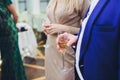 Casual business team toasting with champagne in moder office startup. Close-up of glass. Royalty Free Stock Photo