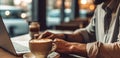 Casual businessman, freelancer relaxed working on laptop computer and drinking morning coffee at home office or coffee Royalty Free Stock Photo