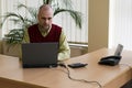 Casual businessman with laptop Royalty Free Stock Photo