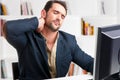 Casual Businessman With Pain In His Neck Royalty Free Stock Photo