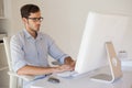 Casual businessman working at his desk Royalty Free Stock Photo