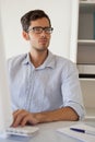 Casual businessman working at his desk Royalty Free Stock Photo