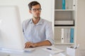 Casual businessman working at his desk Royalty Free Stock Photo