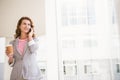 Casual businesswoman having a phone call Royalty Free Stock Photo