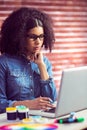 Casual businesswoman using her laptop Royalty Free Stock Photo