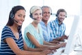 Casual call centre workers looking at the camera Royalty Free Stock Photo