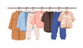 Casual clothes hanging on rack. Garments row on hanger rail. Modern wardrobe, wearing for charity. Different women Royalty Free Stock Photo