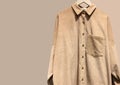 Casual corduroy shirts with pocket on a hanger isolated Royalty Free Stock Photo