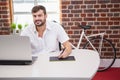 Casual designer using graphics tablet and laptop Royalty Free Stock Photo