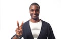 Casual dressed black man showing peace sign.