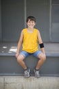 Casual dressed young smiling teen skater outdoors portrait