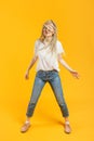 Casual dressed young woman with kanekalons or braids having fun. Headbanging Royalty Free Stock Photo