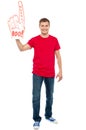 Casual guy showing large pointy boo hurray hand Royalty Free Stock Photo