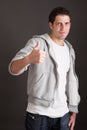 Casual guy thumbs up - success