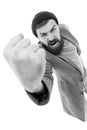 Casual and informal. Bearded man in casual style shaking his fist with anger. Fashion male model wearing casual jacket