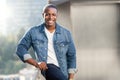 Casual lifestyle portrait of an african american male with perfect white teeth smile, commercial model Royalty Free Stock Photo