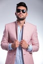 Casual man adjusts his jacket Royalty Free Stock Photo