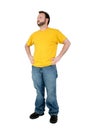 Casual Man In Baggy Pants And Yellow Shirt Over White