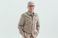 Casual man in his 60s posing with hands in pockets Royalty Free Stock Photo