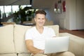 Casual man with laptop Royalty Free Stock Photo