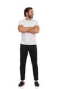 Handsome Man Is Standing With Arms Crossed And Looking Away. Front View Royalty Free Stock Photo