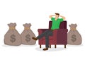 Casual man relaxing at home in his couch with bags of money