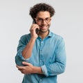 Casual man talking on the phone and smiling Royalty Free Stock Photo