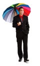 Casual man walking with colorful umbrella