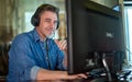 Casual man working with computer in office Royalty Free Stock Photo