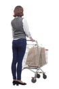 casual mature woman with shopping cart . isolated on a white Royalty Free Stock Photo