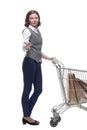 casual mature woman with shopping cart . isolated on a white Royalty Free Stock Photo