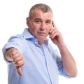 Casual middle aged man thumb down on the phone Royalty Free Stock Photo