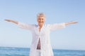 Casual senior woman with arms outstretched Royalty Free Stock Photo