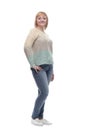 casual smiling woman in jeans and a white jumper.